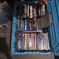 Plastic Tubs Full Of DVDs