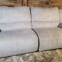 Ashley Furniture electric reclining sofa light grey
