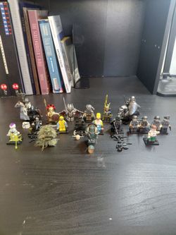 Lego figures toys - $4 each ( all 18 for $60 with display podium