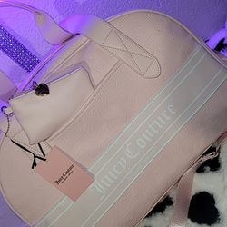 Juicy Couture Pink Weekender duffle bag.