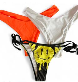 3 Vibrant swimwear bikini bottom from SHEIN  Included orange bottom, white bottom and smile black and yellow bottom  $20 