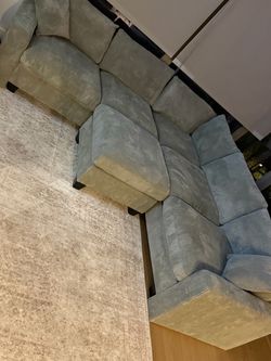 Near new sectional and ottoman