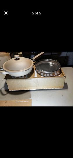Pan and pots  brand: our place,  Brand  new in the box  Pick up in sun valley  Cash only  Comes in a beige color