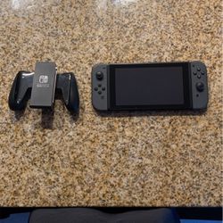 Nintendo Switch With Controller.