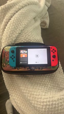 Nintendo switch w/ games and carrying case
