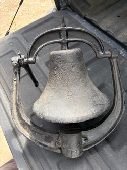 Old cast iron school or dinner bell