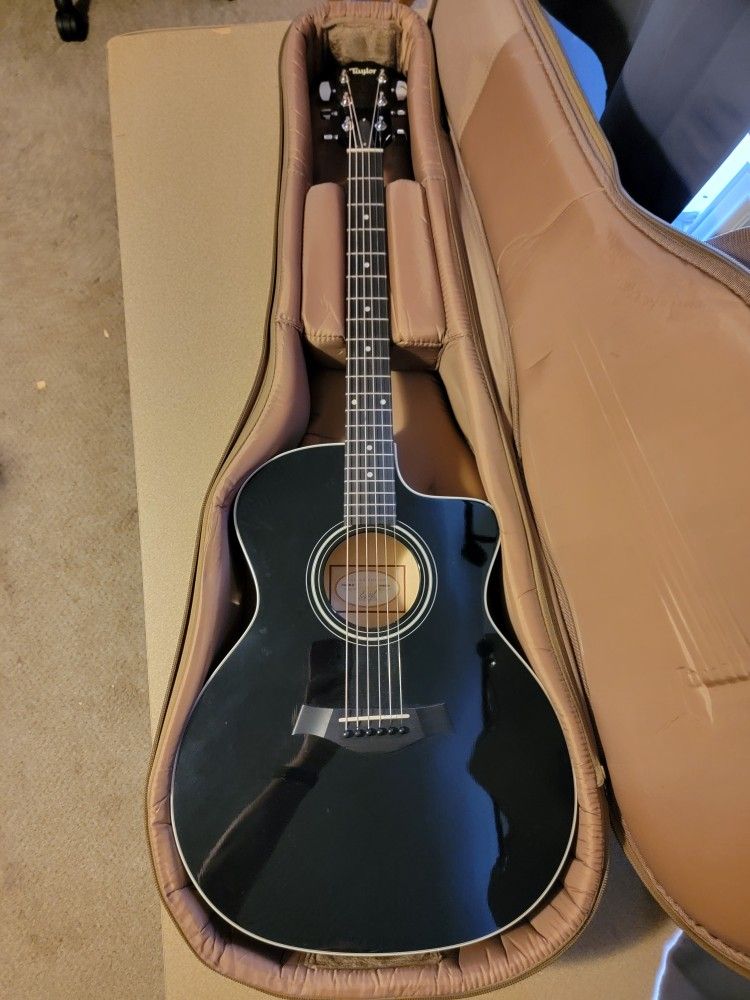 Taylor 214ce-blk Delux Acoustic Guitar 