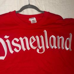 Linda, authentic Disney Store sweatshirt, red color, the sweatshirt fits a size 2XL, brand new