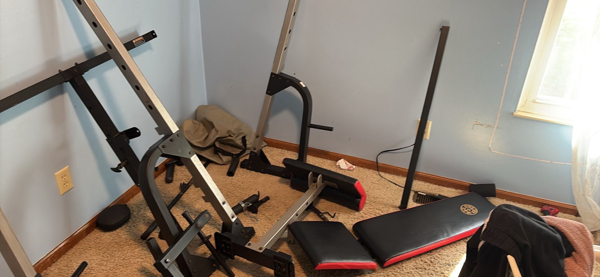 Golds gym workout bench and barbell holder