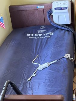 Invacare full electric bed with Span-American Pressure Guard Easy Air LR