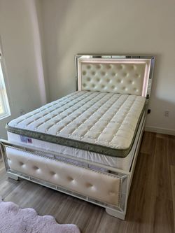 Queen Bed Frame With Led Lights Mattress Included.
New in a box        
We offer delivery and instal