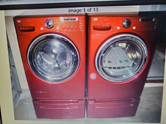 LD RED STEAM WASHER ANELECTRIC OR GAS DRYER WITH PEDESTALS