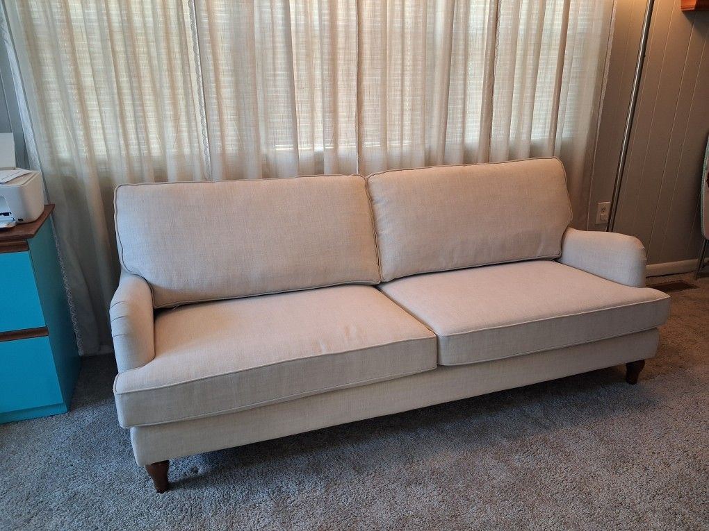 beige linen-like sofa