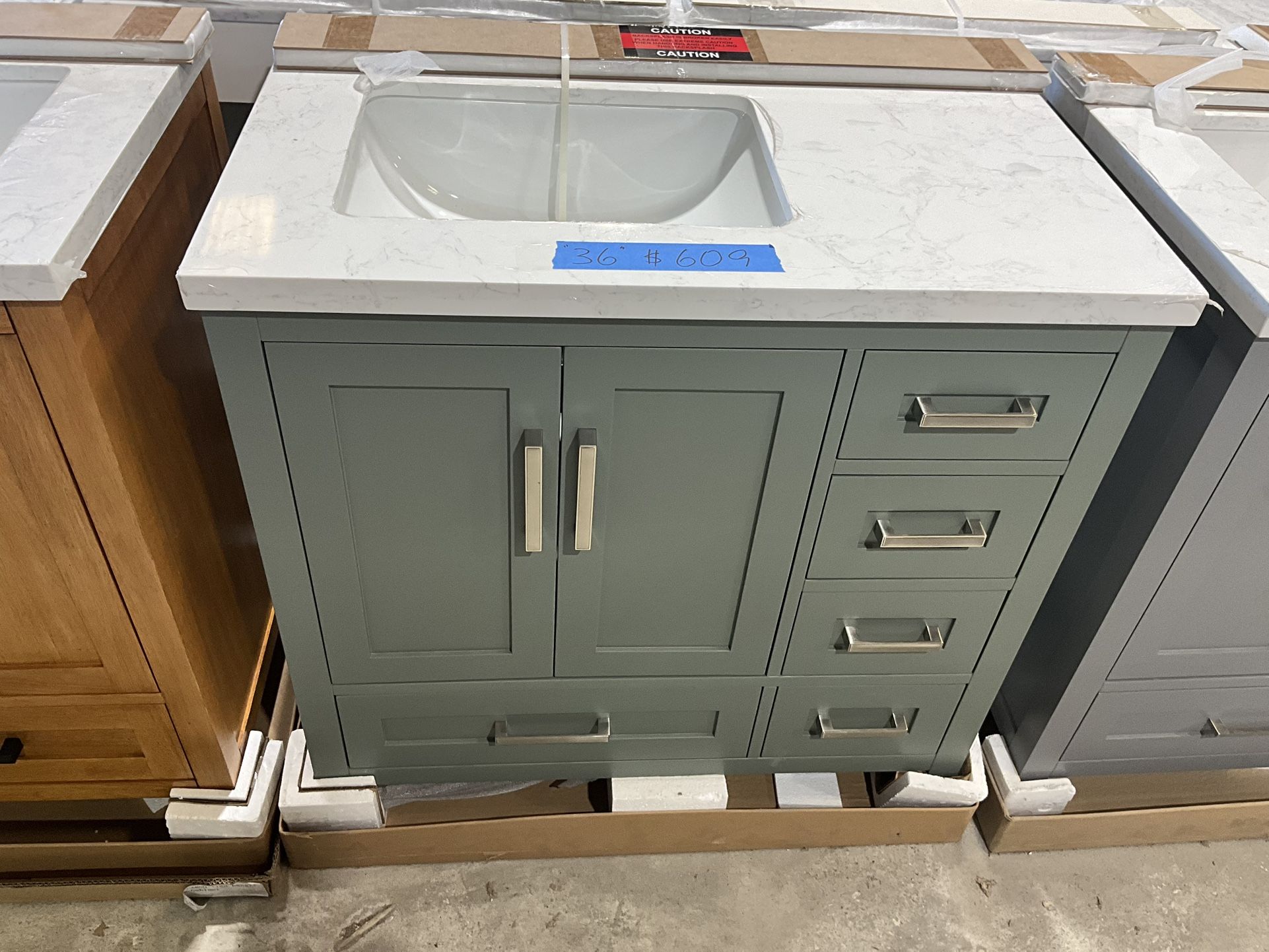 36” Bathroom Vanity in green , single sink soft close solid wood with vanity top in white  $609  Luke’s liquidations warehouse Address:  2434 N Forsyt