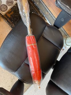 Red paper parasol with bamboo handle