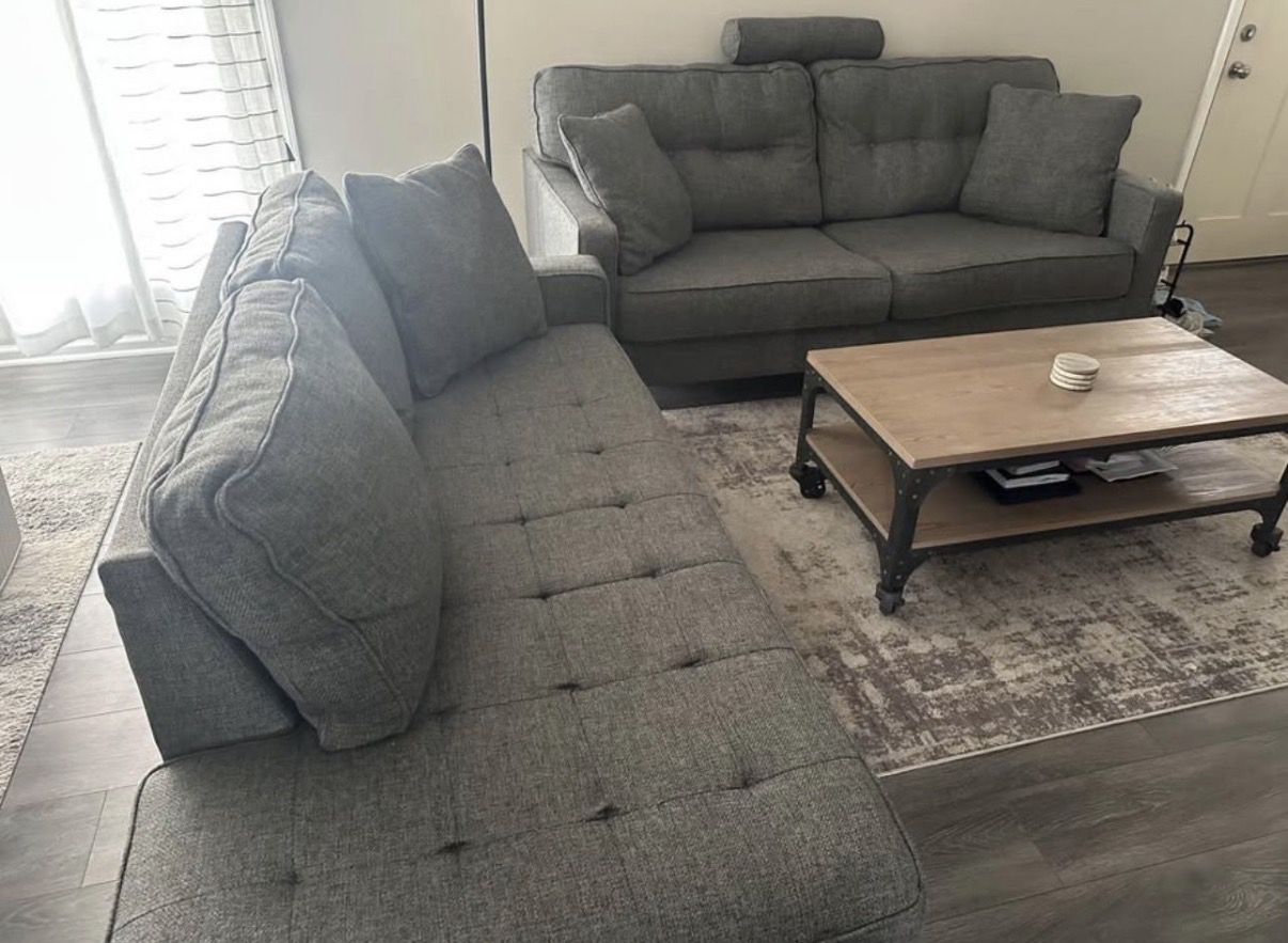 Grey couches - open to negotiations