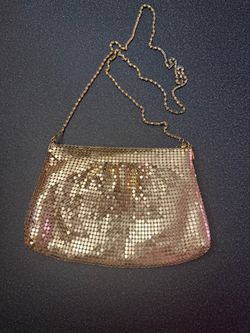 Small golden cross body purse with golden chain