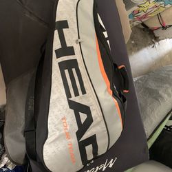 Three Squash Racquets And Bag