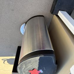 Tall stainless trash can