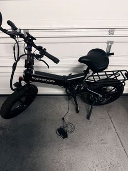 PUCKIPUPPY 750W Electric Fat Tire Bike – Low Mileage