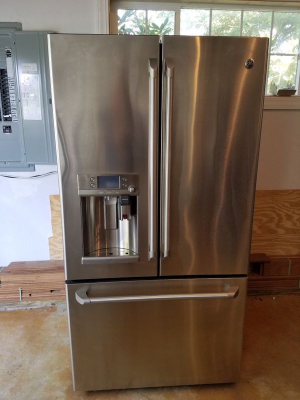 Ge Cafe Series 27 8 Cu Ft French Door Refrigerator Never Been Ge Cafe Series 27 8 Cu Ft French Door Refrigerator Never Been Used Minor Ding On Freezer Model Is Cfe28ushss And Retails For Over 2 800