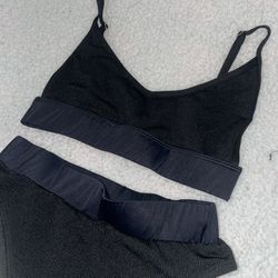 Plain black unpadded cami top swimsuit with thick high waisted bottoms 