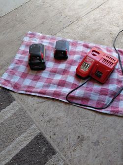 Milwaukee charger and 2 batteries 18 -v