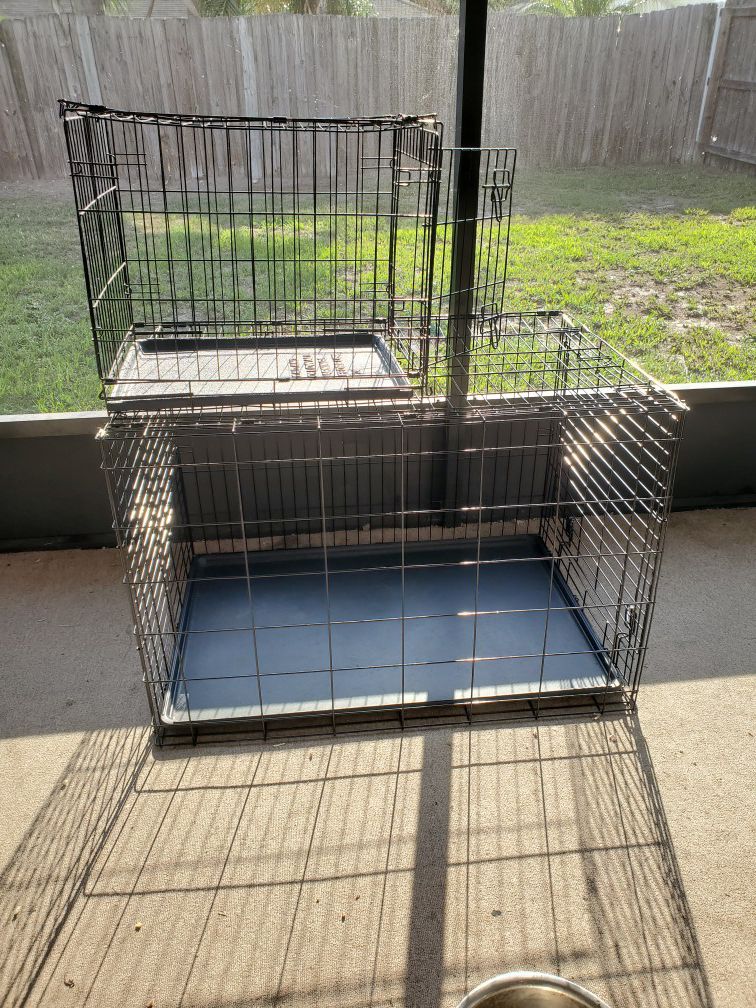 A small & a XL dog crate. $20.00 for the small $45 for the XL
