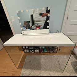 Vanity table with separate mirror fixture. Willing to sell as set or separately.