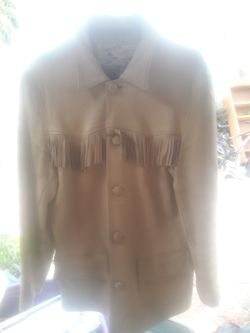 Heldts leather coat with fringes on it