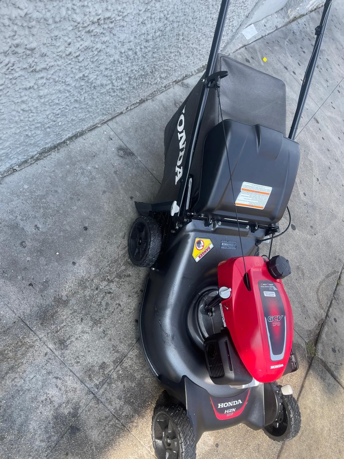 Honda HRN 216 21-in Gas Self-propelled Lawn Mower with 166-cc Engine