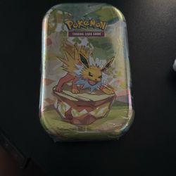 Pokemon Prismatic Evolutions Tin 