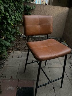 Brown leather bar stools