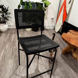 2 black cane/ rattan counter bar stools