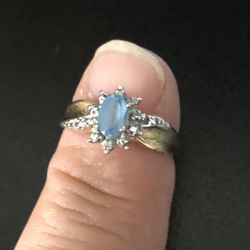 Ladies blue topaz with diamond accents