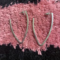 These are pre-love, silver, hoops, and good condition