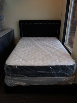 Full size bed with mattress and box springs