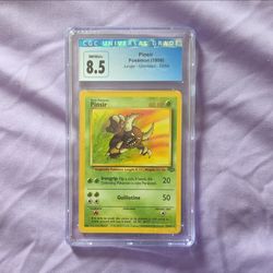 Pokemon pinser 1999 cgc