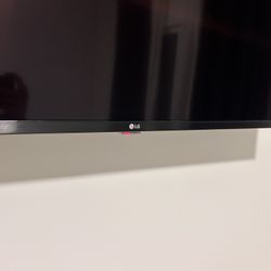LG Flatscreen TV - 55in