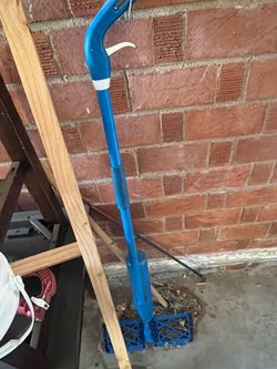 Blue cleaning mop handle