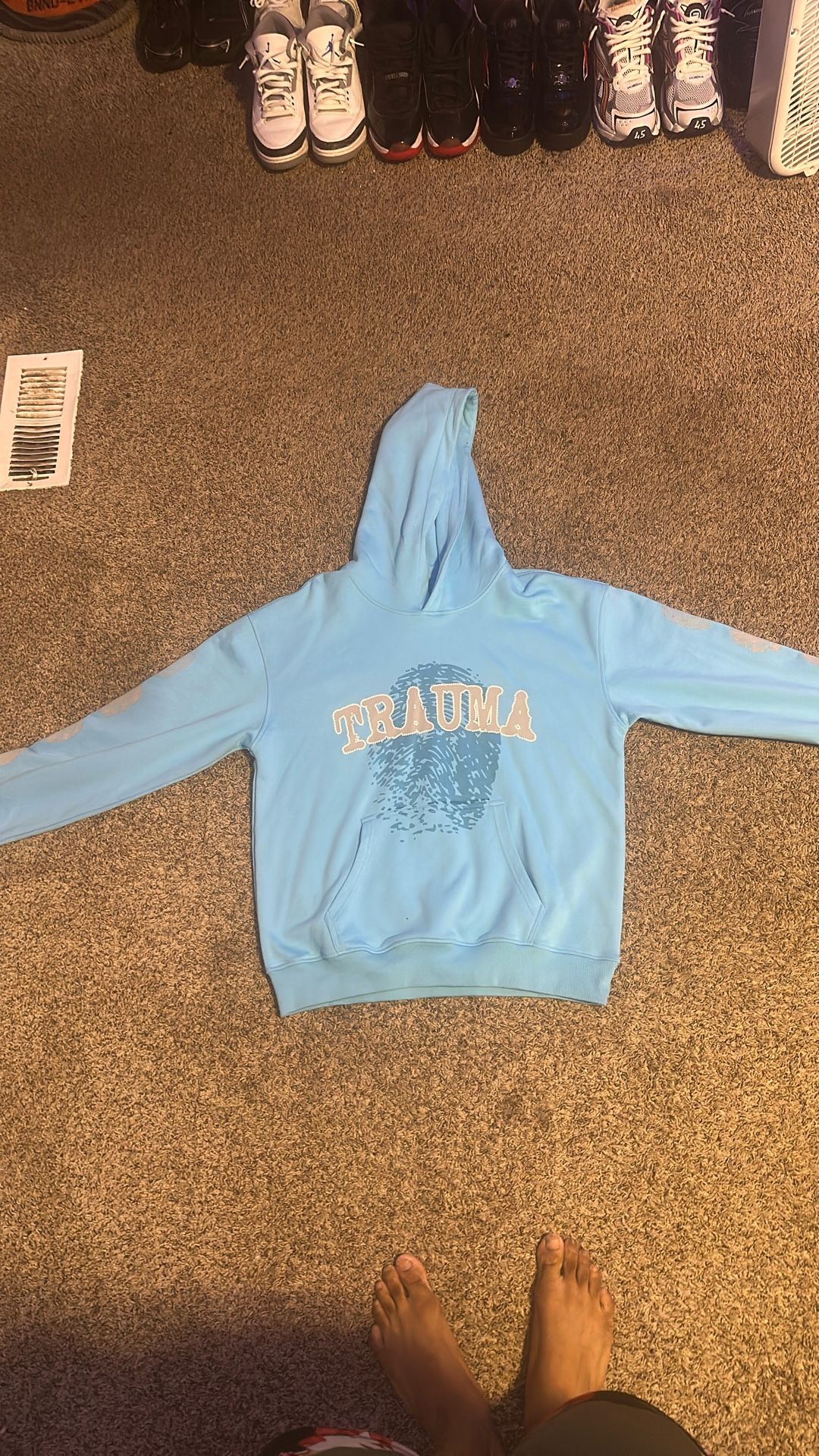 Blue Traumatized Hoodie Size M can Fit a Large 