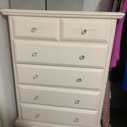 Light pink highboy dresser