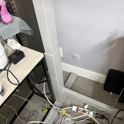 Adjustable white glass desk