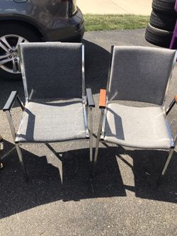 2 sturdy arm chairs