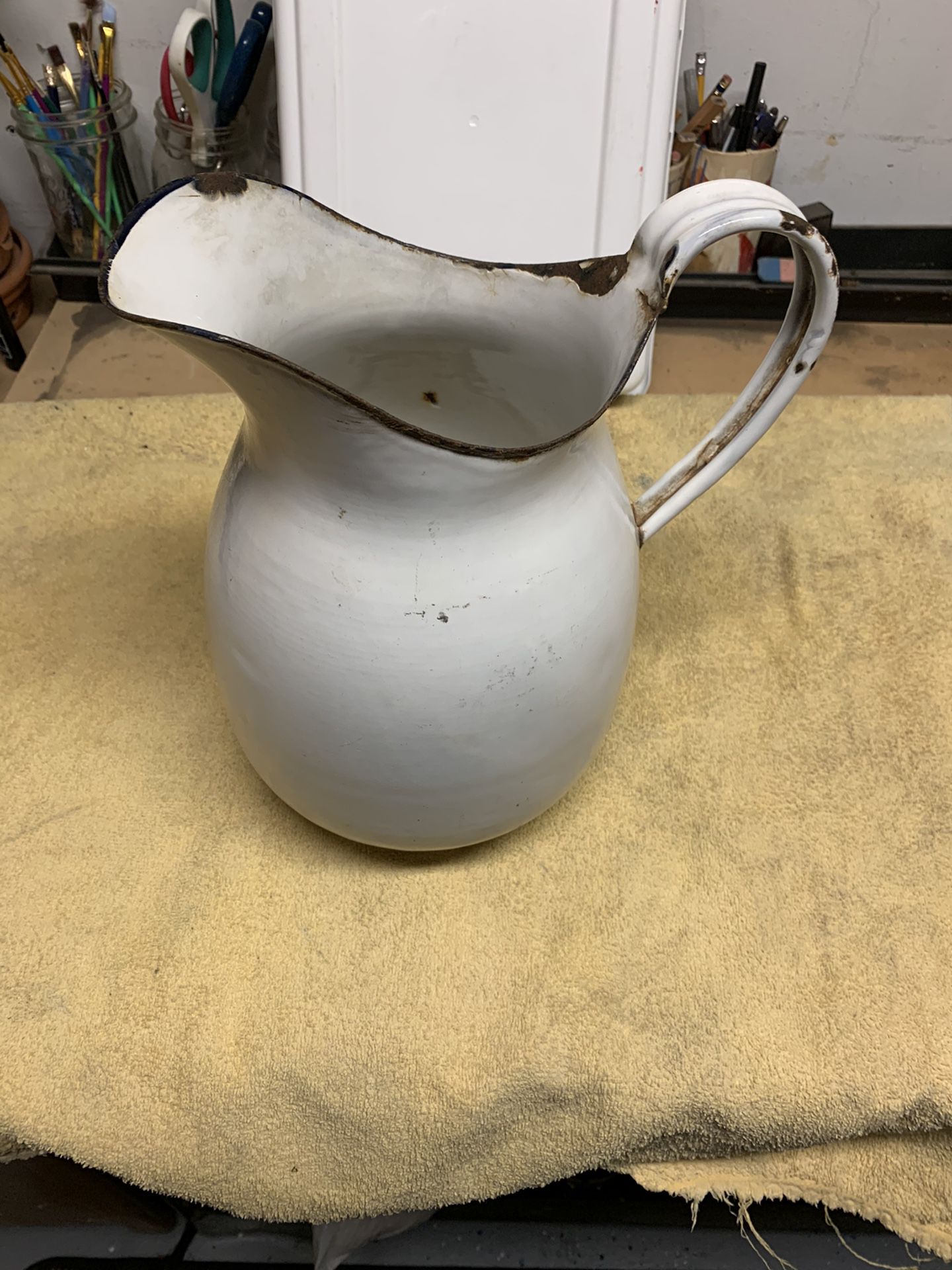 Antique white porcelain pitcher