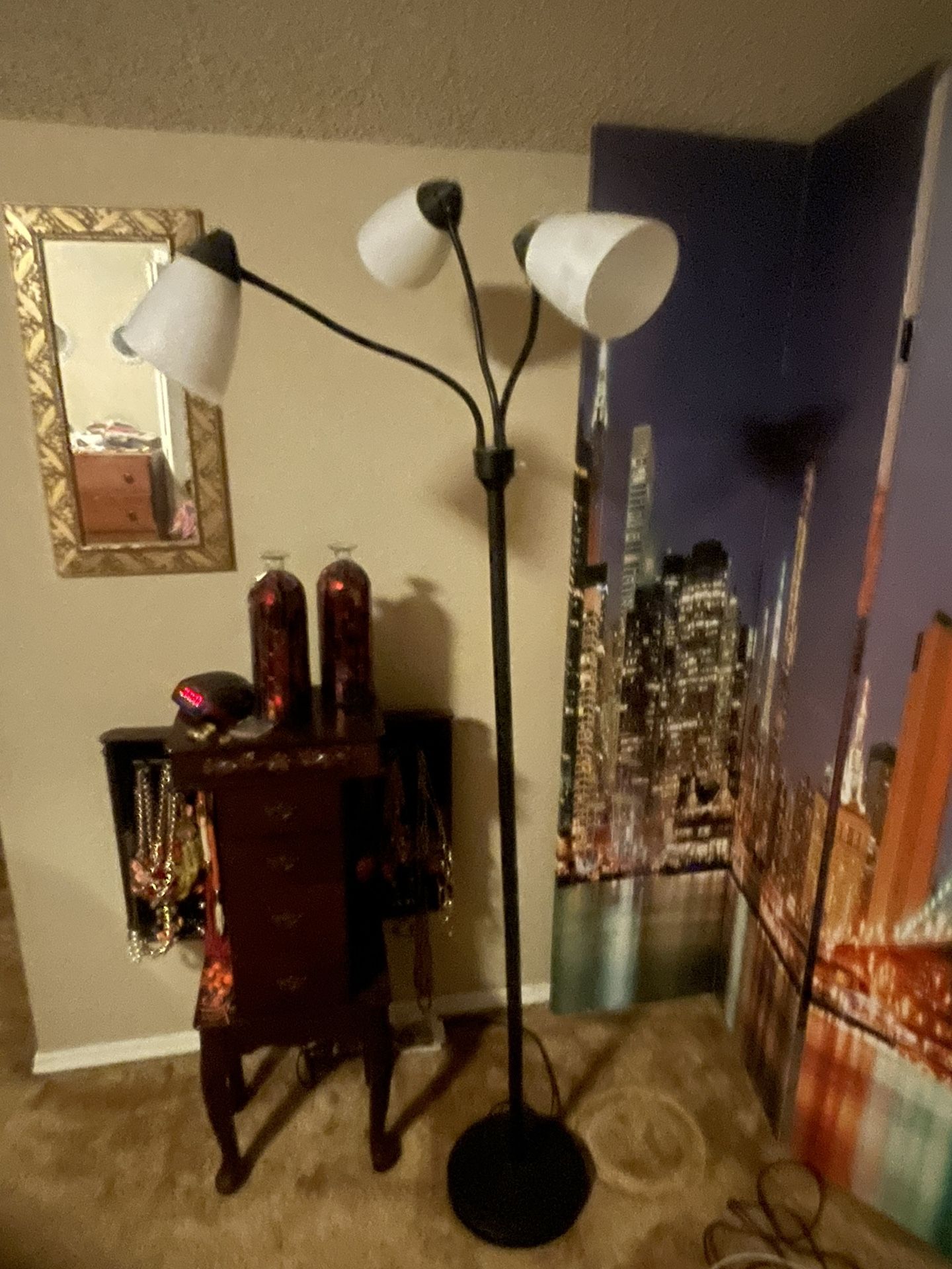 Three light lamp $10 ,4 panel screen $30, Two Red Vases $15