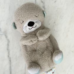 Fisher-Price Soothe ’n Snuggle Otter in good condition. Clean and fully working.