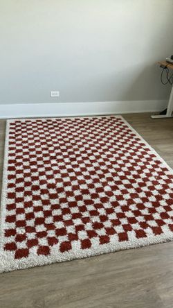 WAYFAIR CREAM AND RUST CHECKERED WATERPROOF AREA RUG