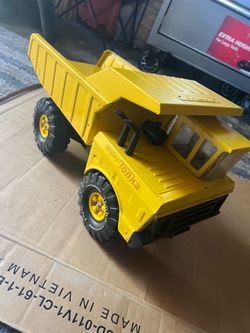 Antique metal mighty Tonka dumpster truck