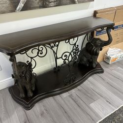 console table (also known as an entryway table or sofa table).